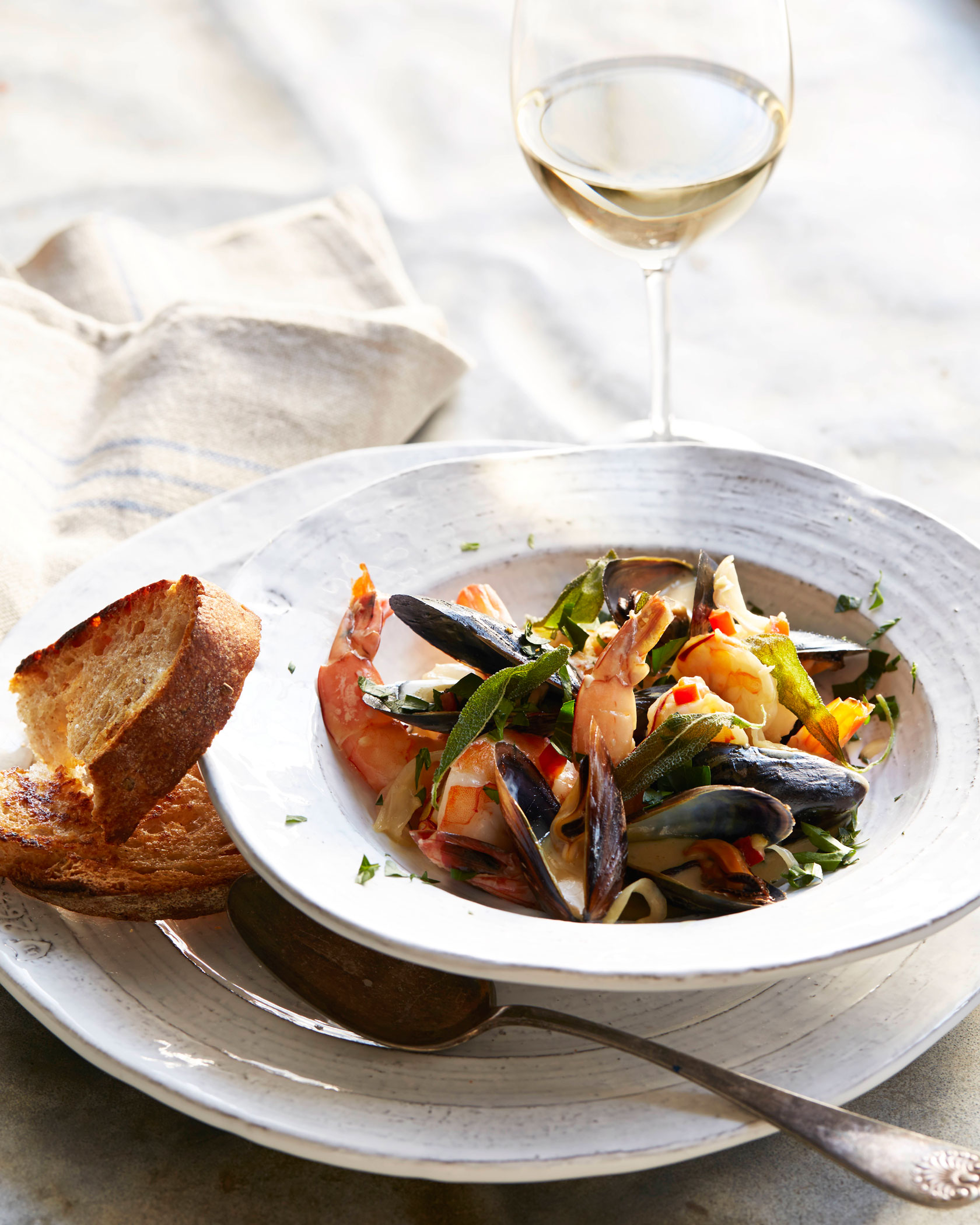 Mussels and Prawns in a Saffron Lemon Cream Sauce with Fried Sage