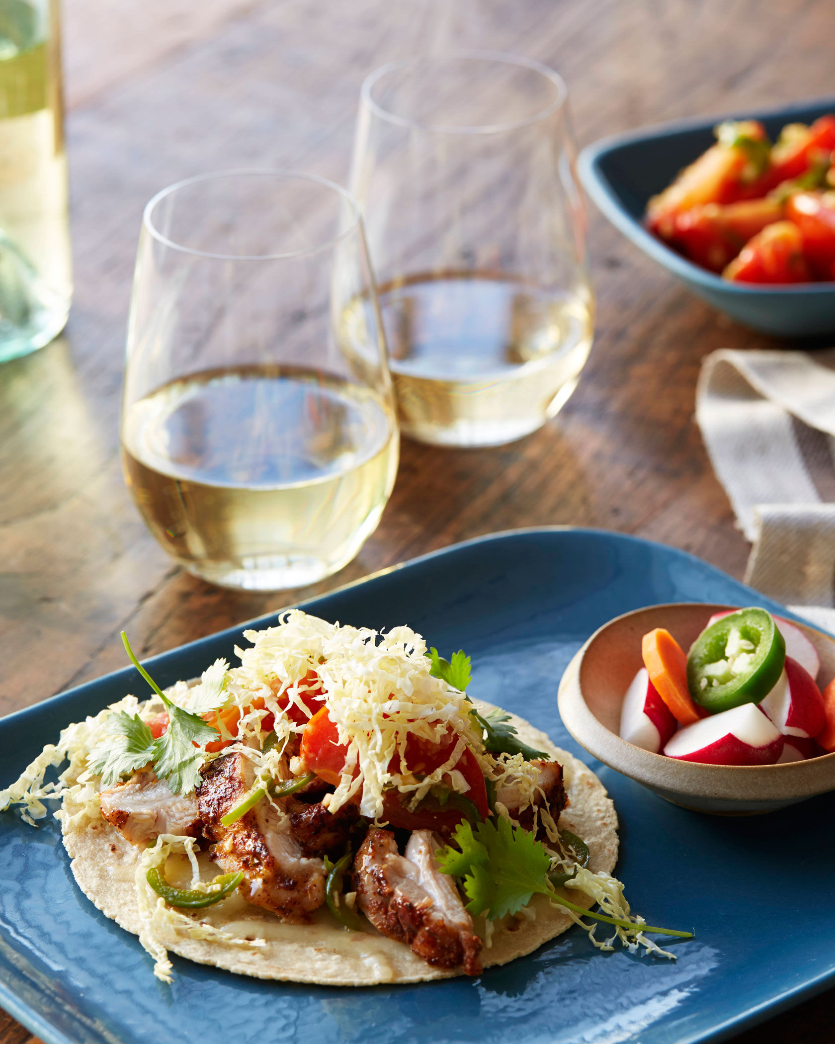 Spice-Rubbed Chicken Tacos with Shredded Napa Cabbage, Cilantro and Monterey Jack Cheese