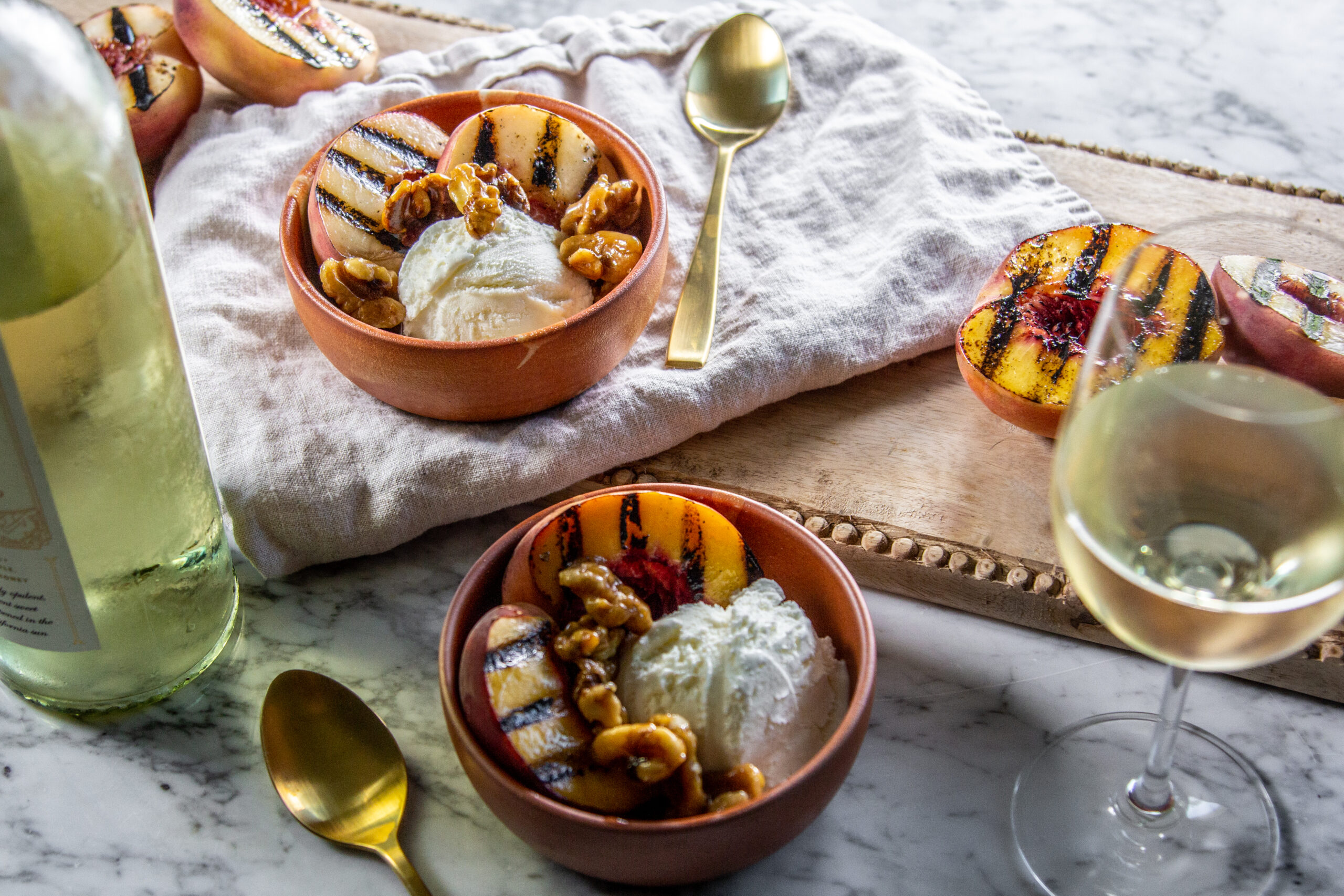 Grilled Peaches with Ice Cream and Honey Walnuts