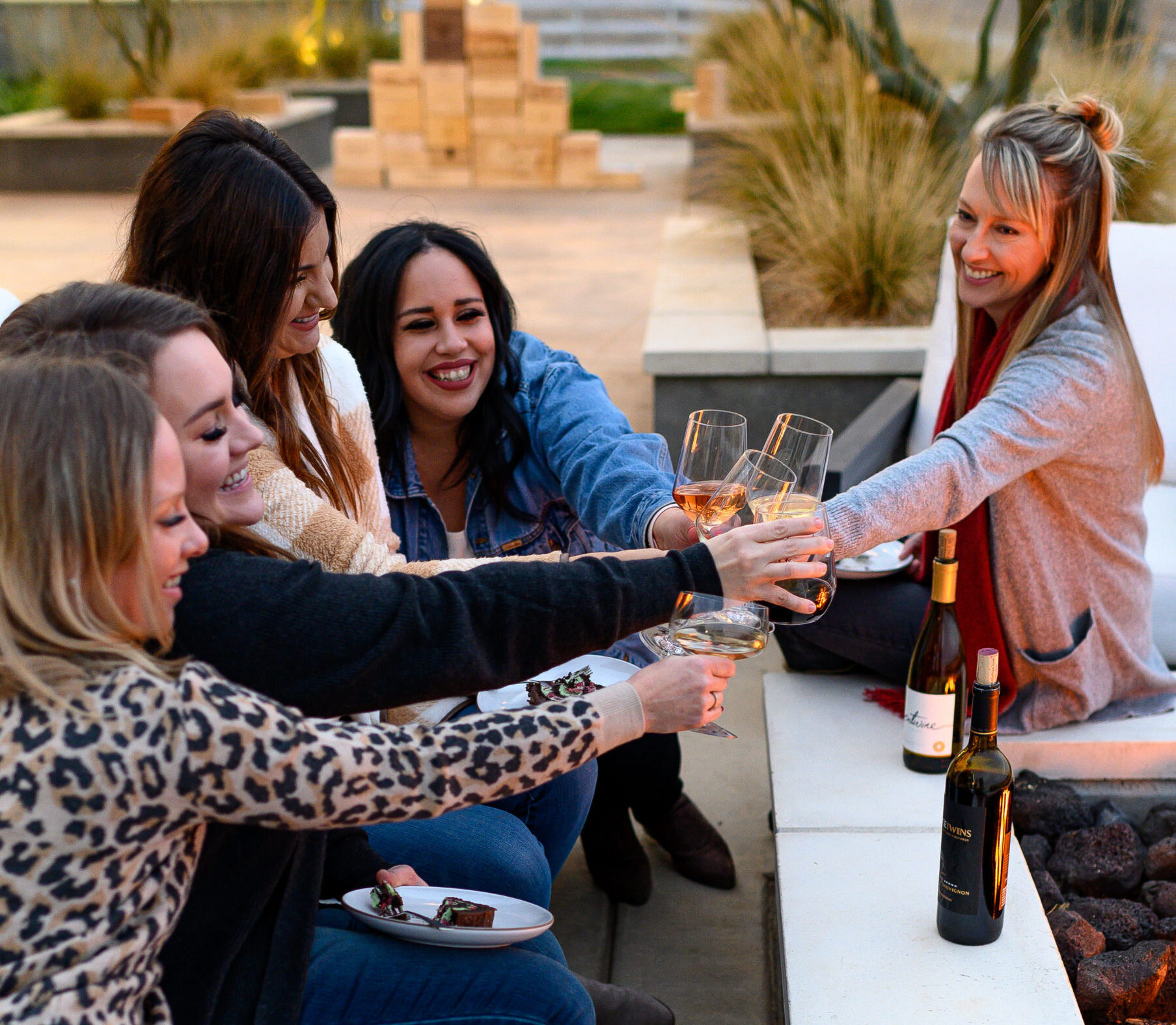 friends enjoy holiday wine at winery