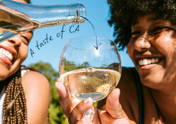 two women pouring and enjoying california wine
